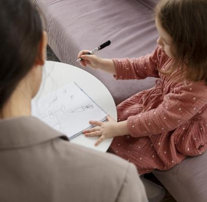 child-doing-therapy-session-with-psychologist
